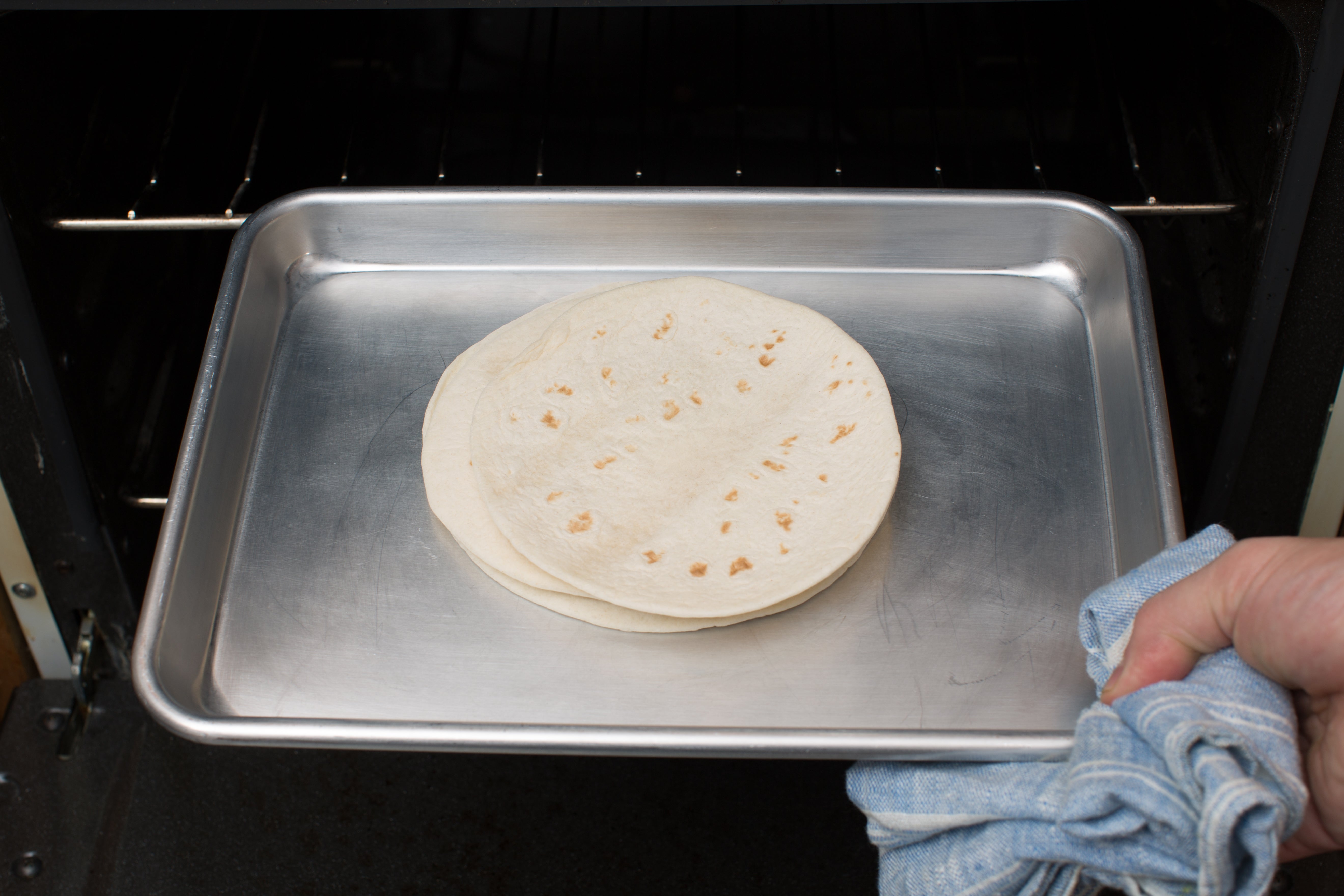 recipe-step-image-Warm the tortillas & make the vinaigrette:}