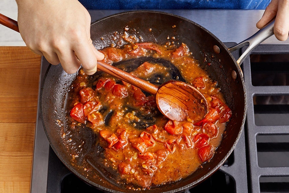 recipe-step-image-Make the tomato pan sauce & serve your dish }