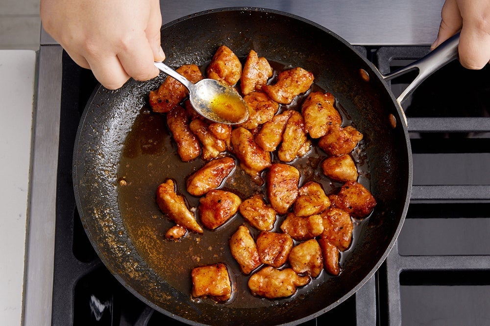recipe-step-image-Coat, cook & glaze the chicken}