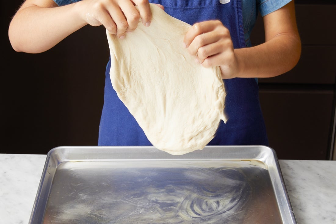 recipe-step-image-Assemble & bake the pizza}