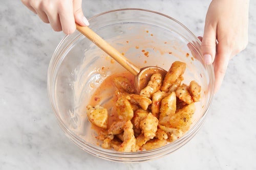 recipe-step-image-Coat, cook & dress the chicken:}