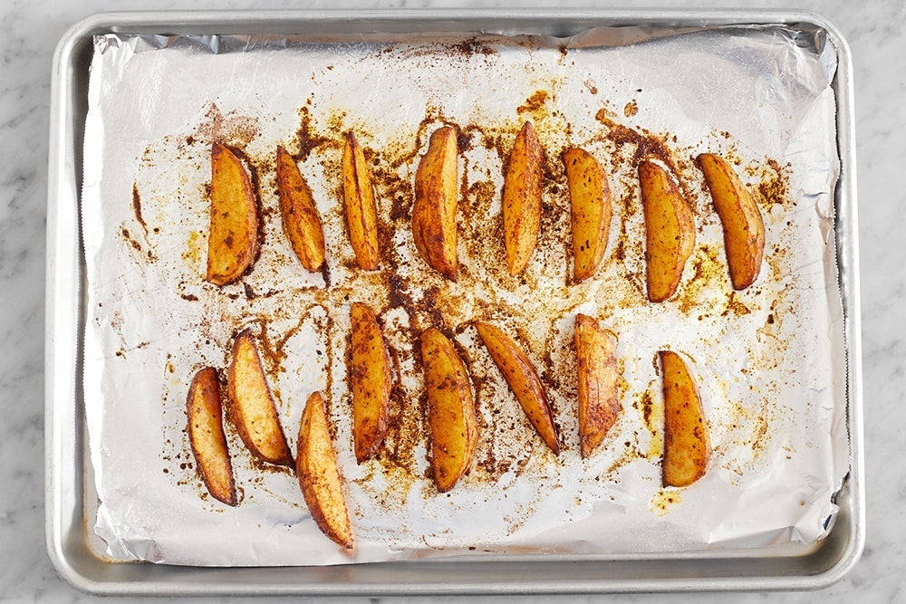 recipe-step-image-Roast the potato wedges}