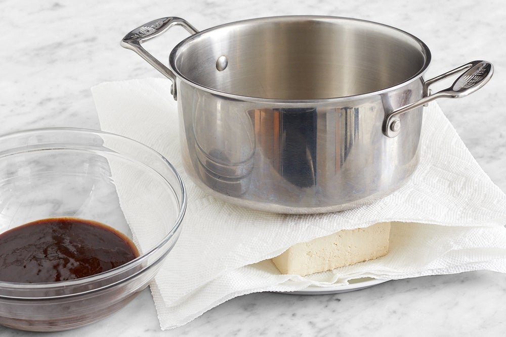 recipe-step-image-Press the tofu & make the glaze}