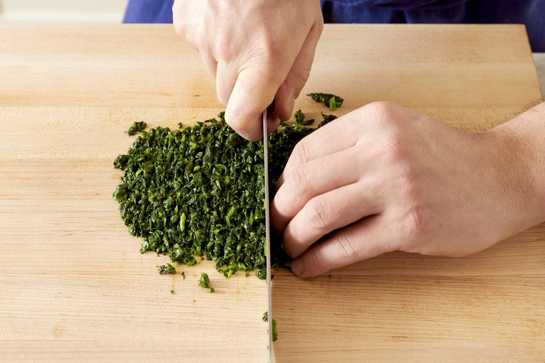 recipe-step-image-Cook & chop the spinach:}