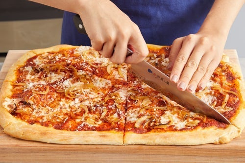 recipe-step-image-Finish the pizza & serve your dish}