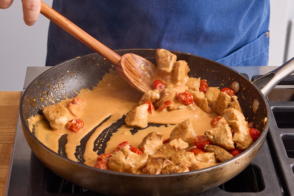 recipe-step-image-Cook the chicken & tomatoes }