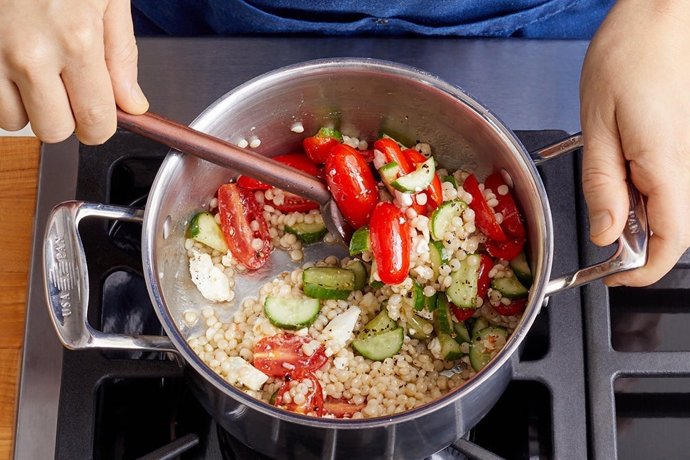 recipe-step-image-Finish the couscous & serve your dish}