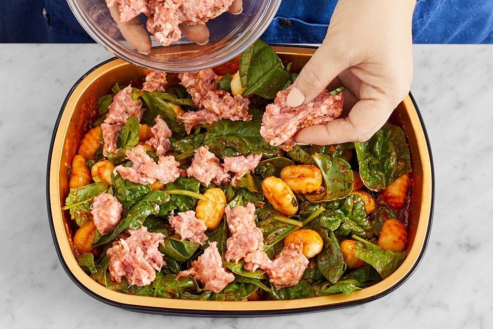 recipe-step-image-Add the pork & bake the tray}