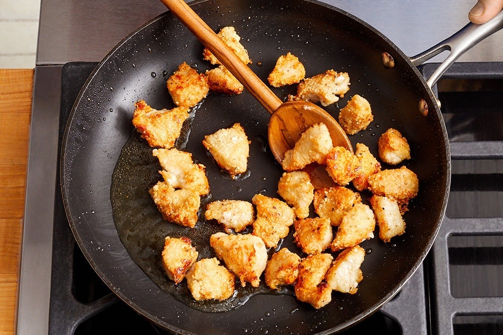 recipe-step-image-Coat & cook the chicken}