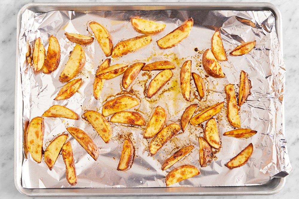 recipe-step-image-Roast the potato wedges}
