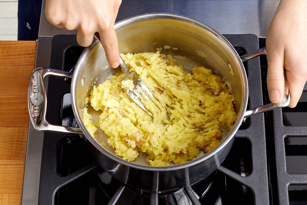 recipe-step-image-Cook & mash the potatoes }