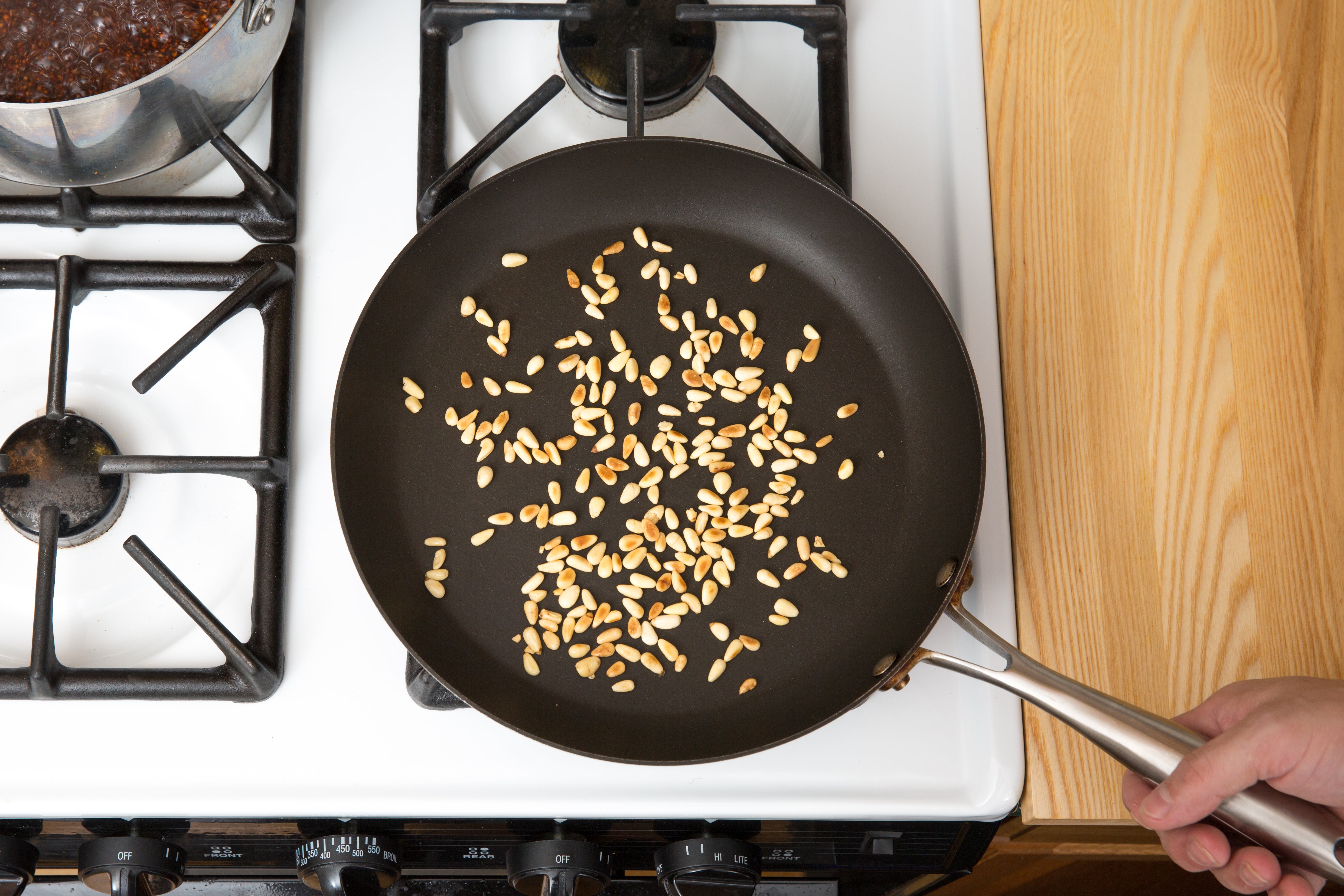 recipe-step-image-Toast the pine nuts:}