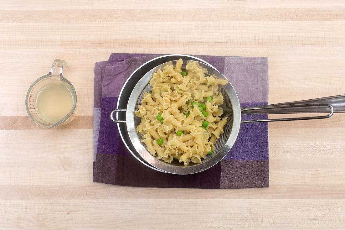 recipe-step-image-Cook the pasta & peas: }
