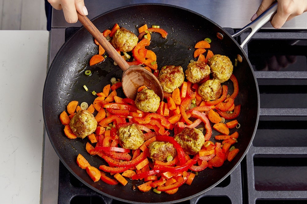 recipe-step-image-Brown the meatballs & vegetables}