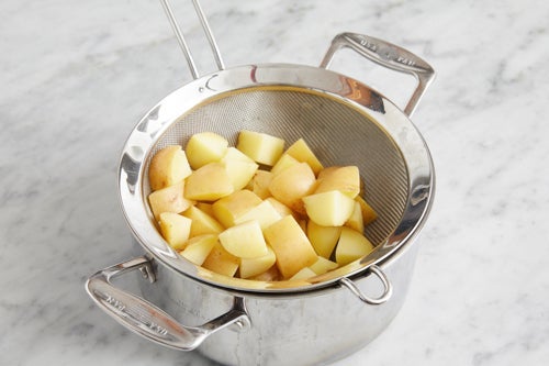 recipe-step-image-Prepare & parboil the potatoes}