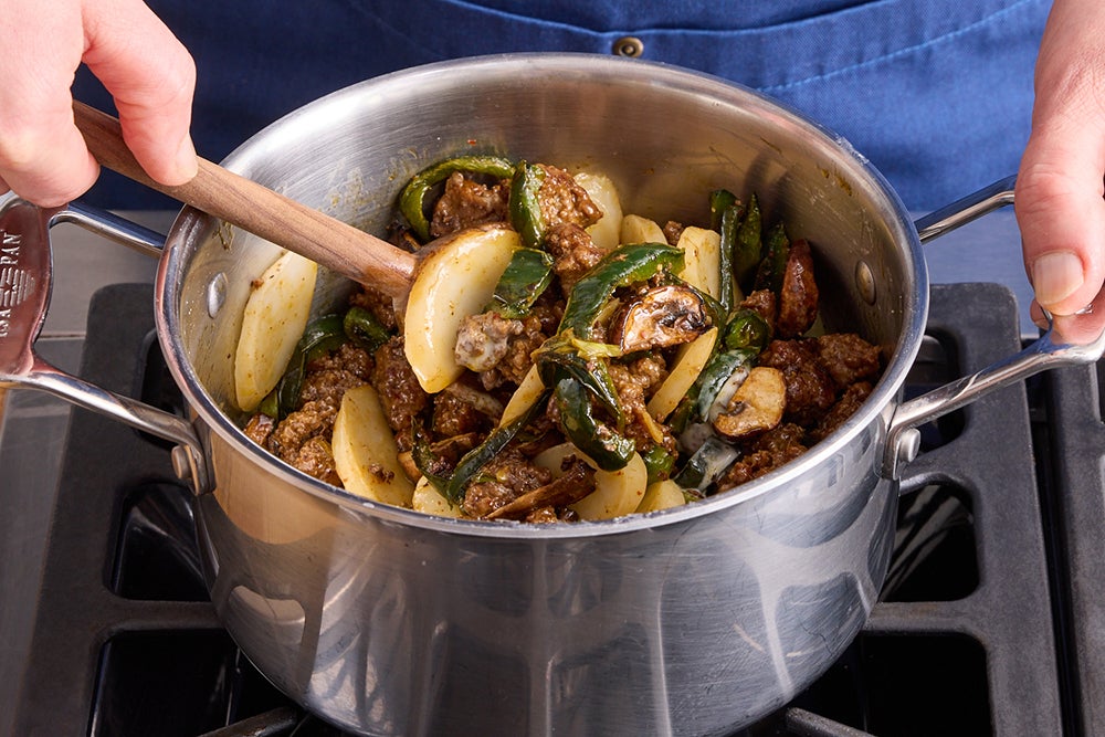 recipe-step-image-Finish the rice cakes & serve your dish}