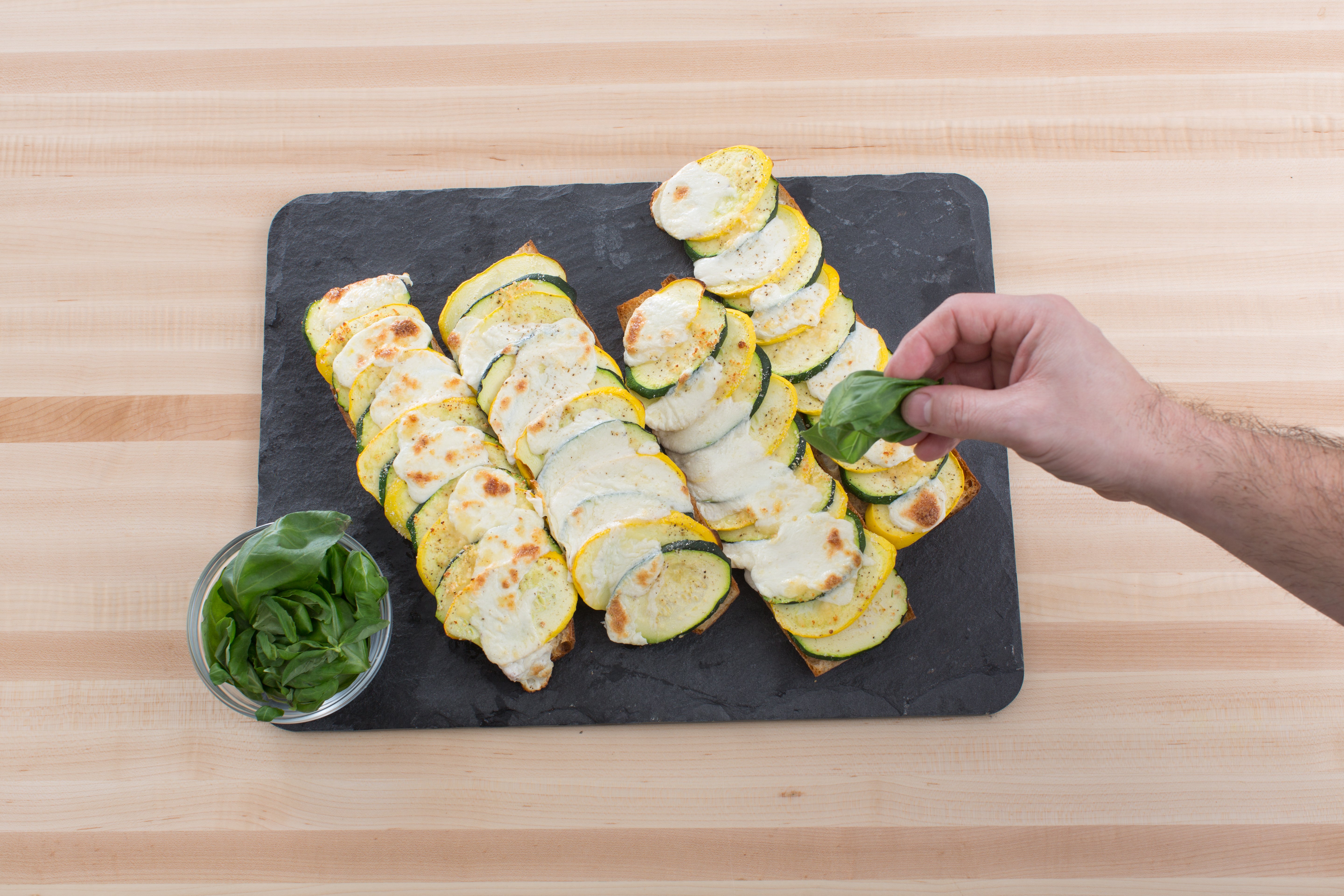 recipe-step-image-Garnish the pizzas & serve your dish:}