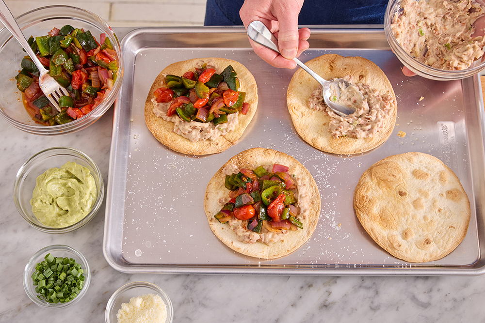 recipe-step-image-Assemble the tostadas & serve your dish}