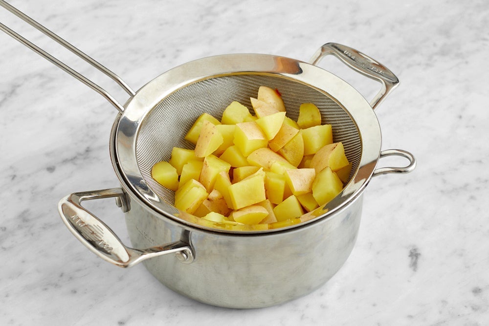 recipe-step-image-Prepare & parboil the potatoes}