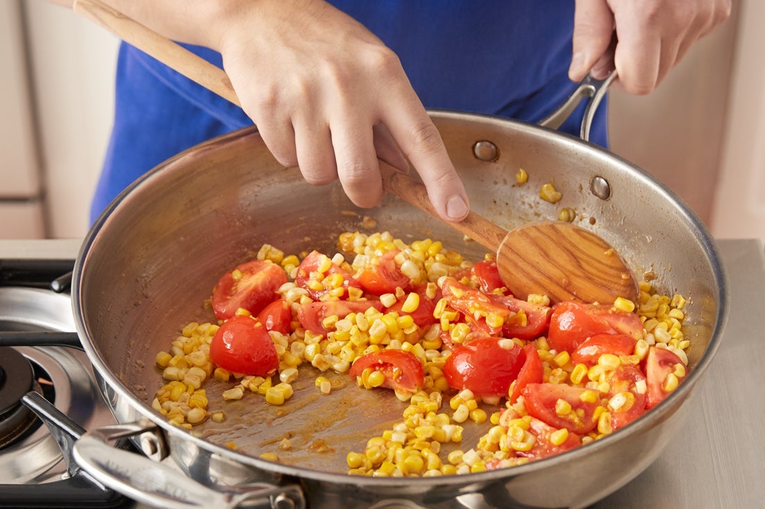 recipe-step-image-Cook the corn & tomatoes:}