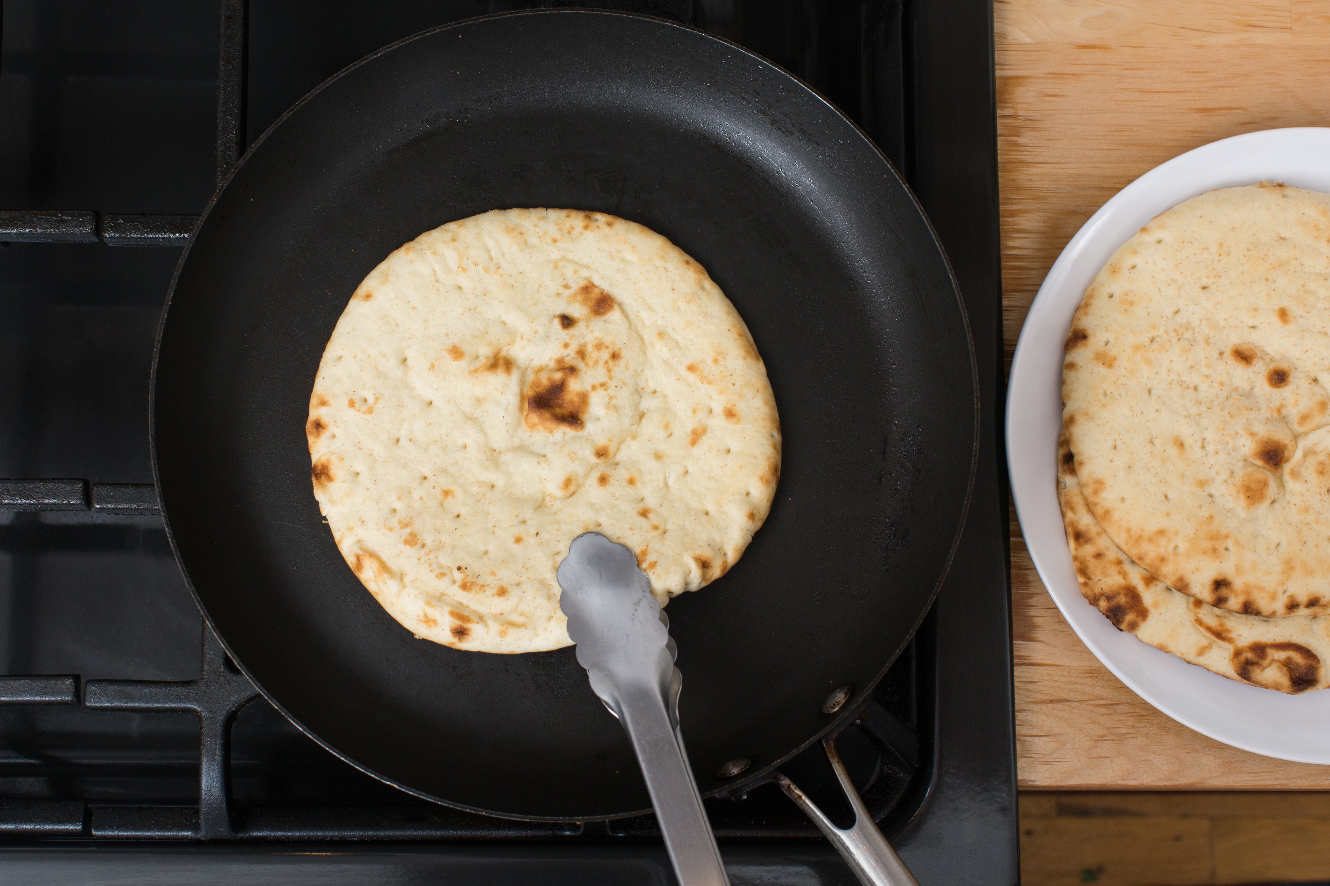 recipe-step-image-Toast the pitas:}