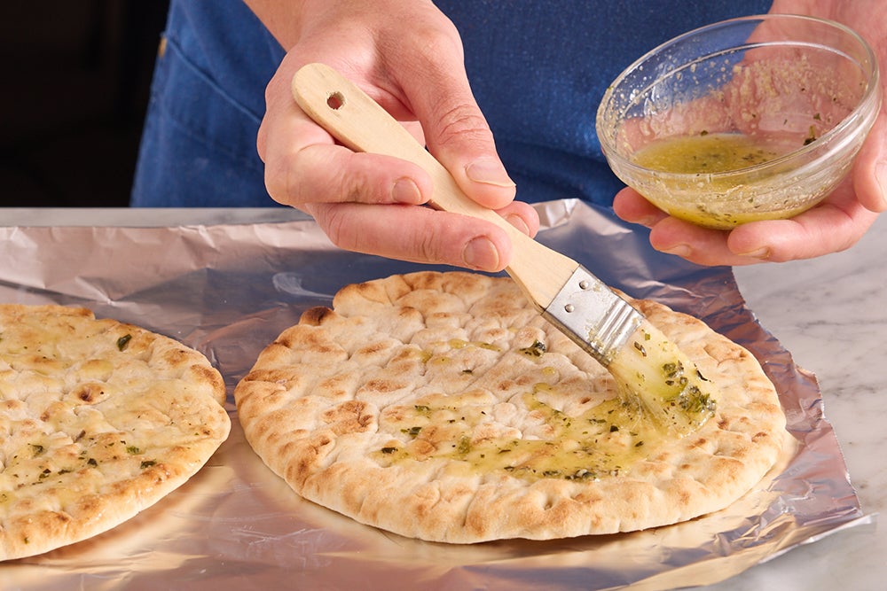 recipe-step-image-Make the garlic pitas & serve your dish }