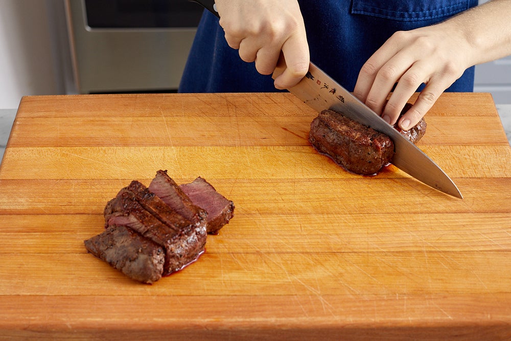 recipe-step-image-Slice the steaks & serve your dish}