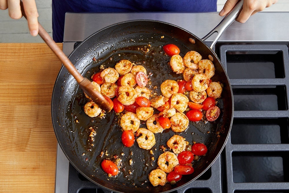 recipe-step-image-Cook the shrimp & tomatoes}