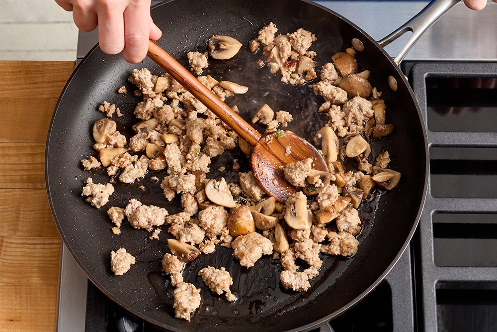recipe-step-image-Cook the pork & mushrooms}