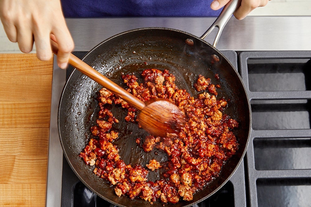 recipe-step-image-Cook the pork & sauce}