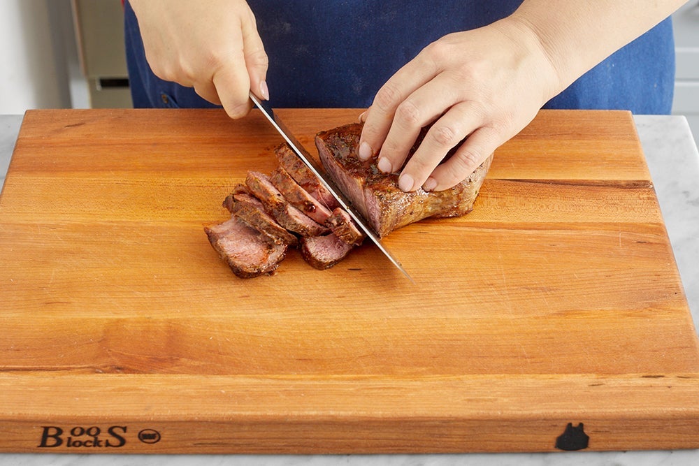 recipe-step-image-Slice the steak & serve your dish}