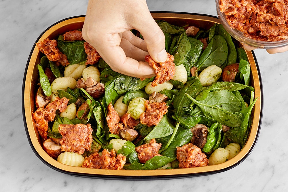 recipe-step-image-Add the sausage & bake the tray}