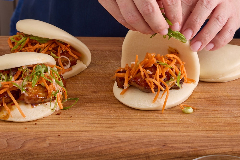 recipe-step-image-Warm the buns & serve your dish}