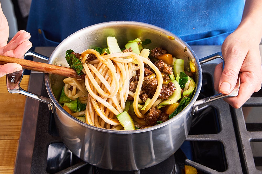 recipe-step-image-Finish the stir-fry & serve your dish}