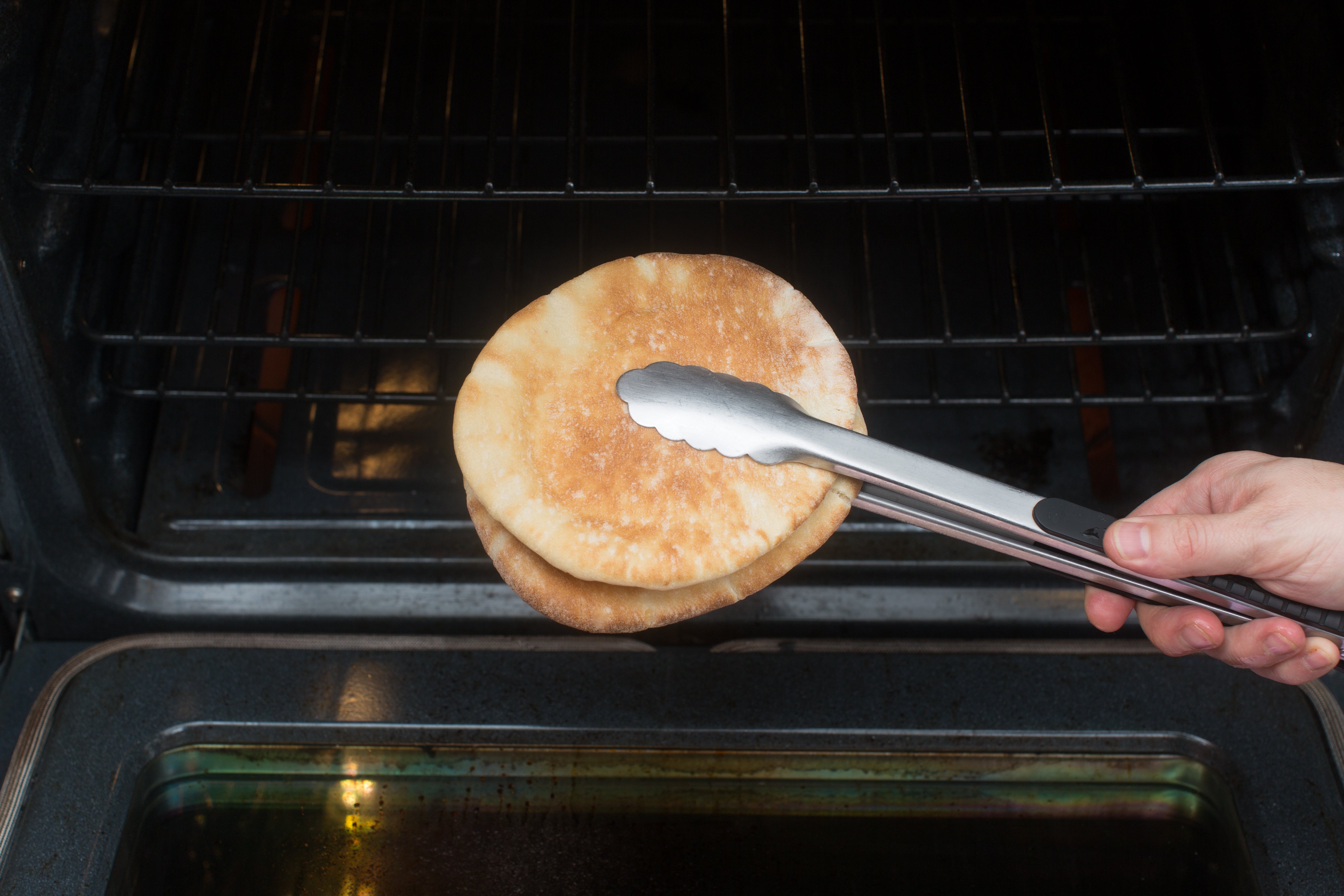 recipe-step-image-Warm the pitas & plate your dish:}