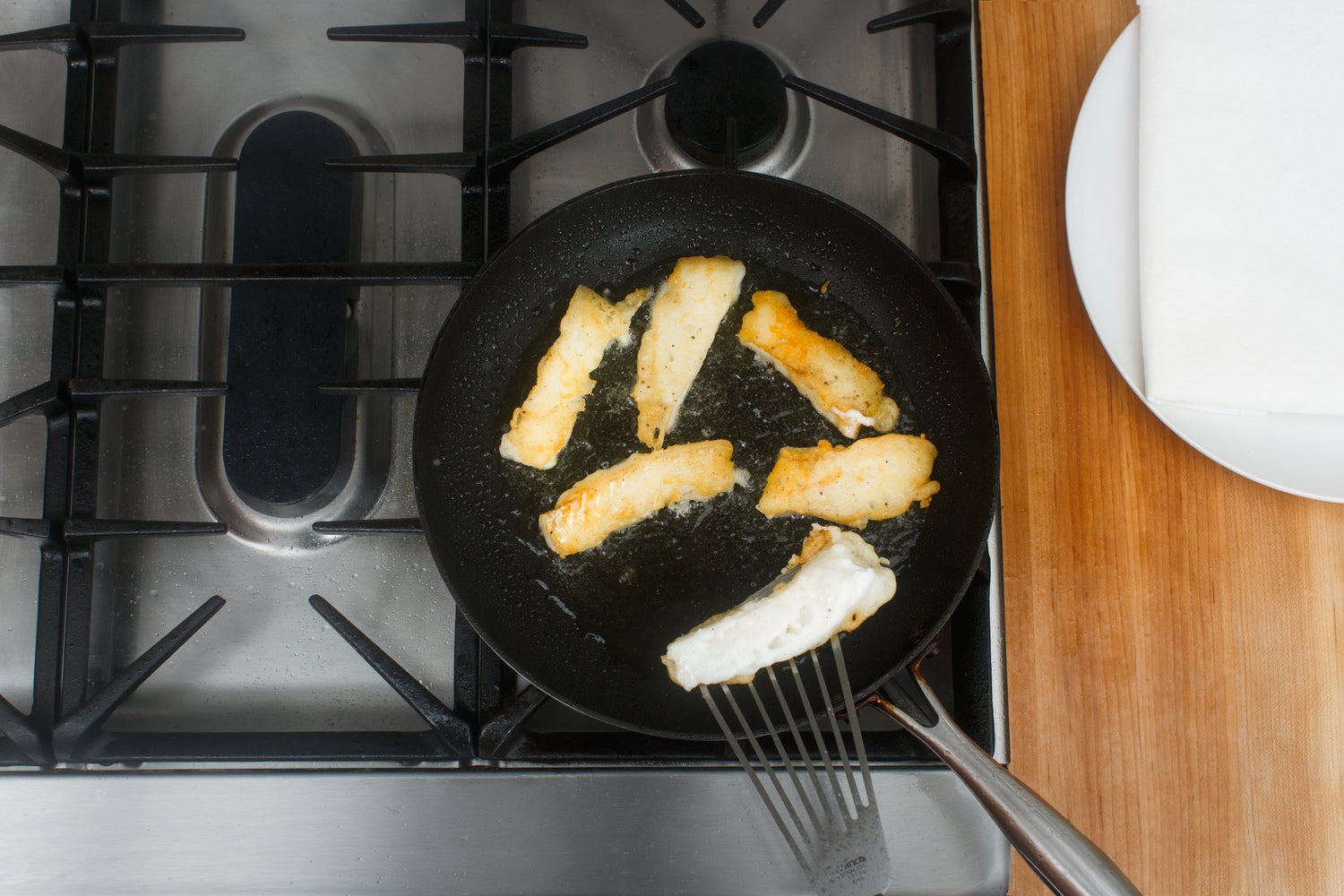 recipe-step-image-Coat & cook the cod:}