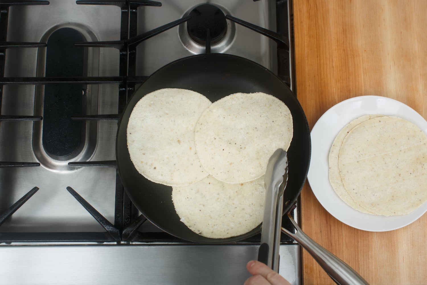 recipe-step-image-Warm the tortillas:}