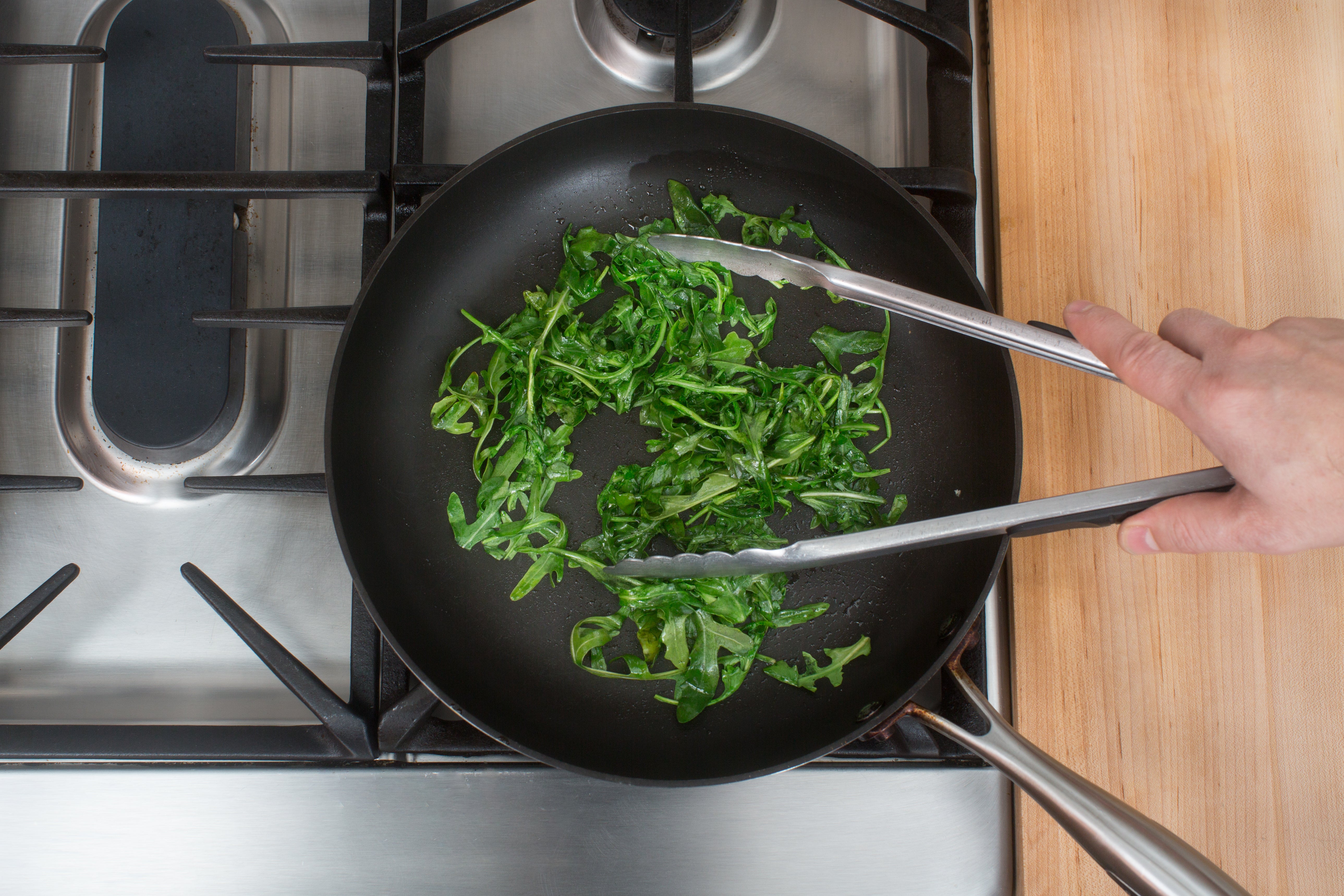 recipe-step-image-Cook the arugula:}