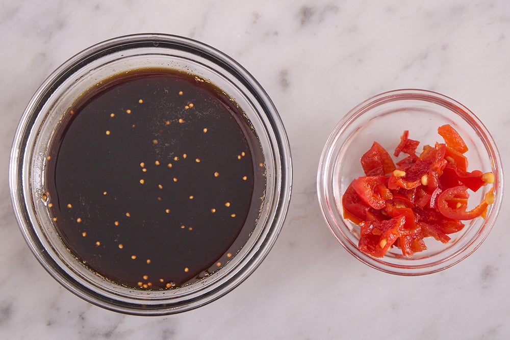 recipe-step-image-Prepare the peppers & start the sauce}