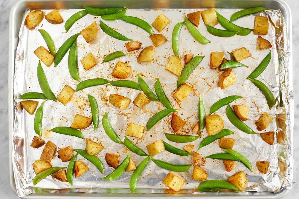 recipe-step-image-Roast the potatoes & peas }