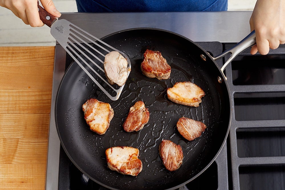 recipe-step-image-Slice & brown the pork belly }