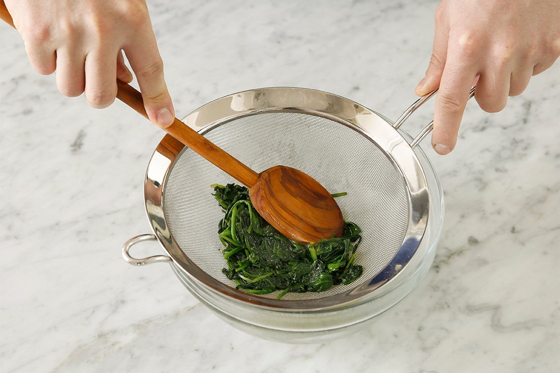 recipe-step-image-Cook & drain the spinach: }