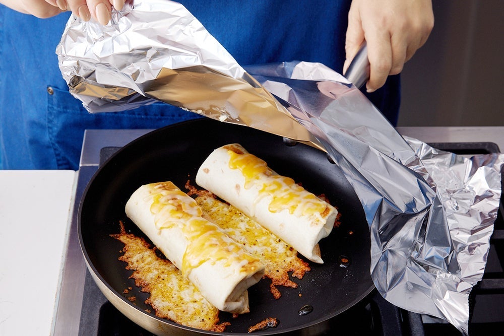 recipe-step-image-Finish the burritos & serve your dish}