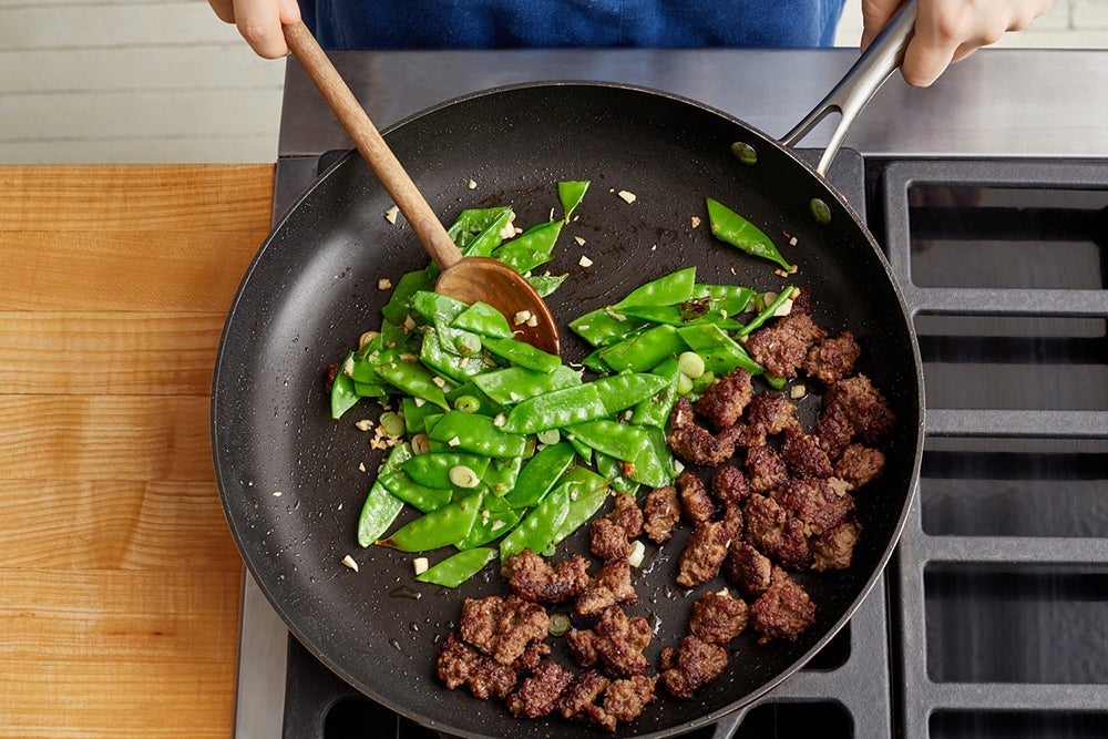 recipe-step-image-Cook the beef & snow peas}