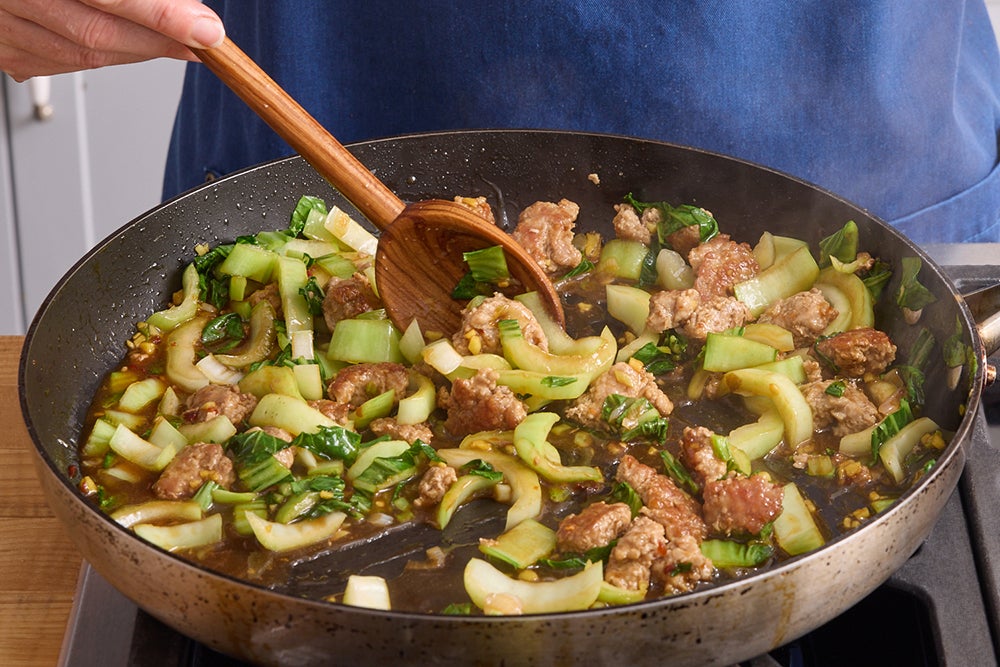 recipe-step-image-Finish the stir-fry & serve your dish}