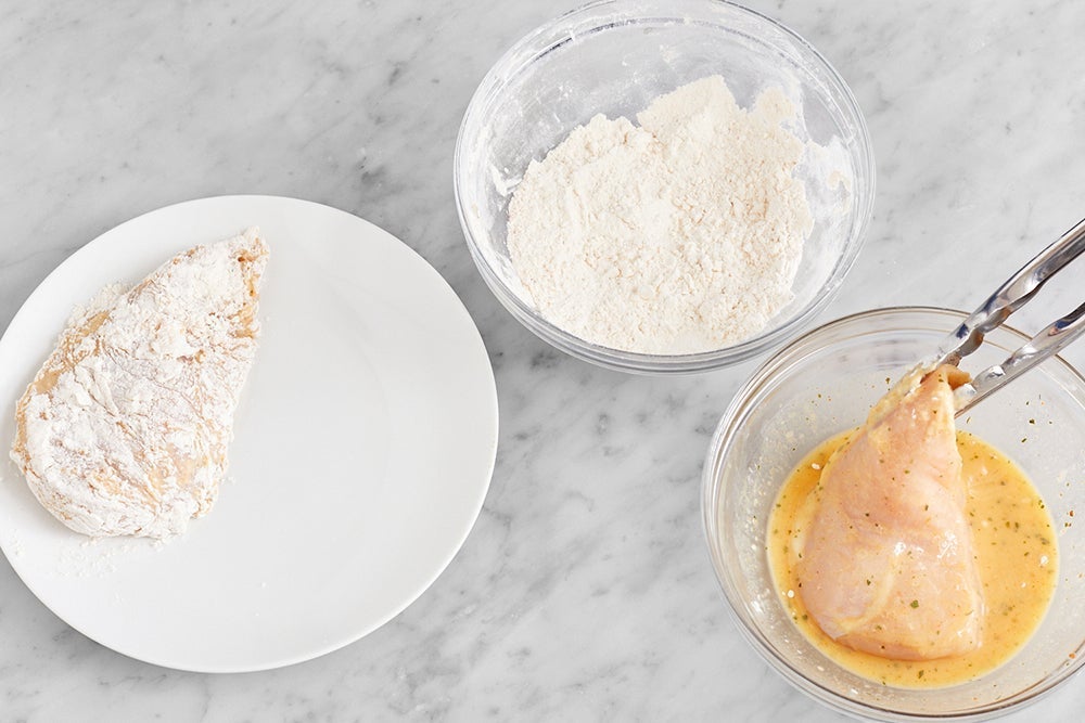 recipe-step-image-Coat the chicken }