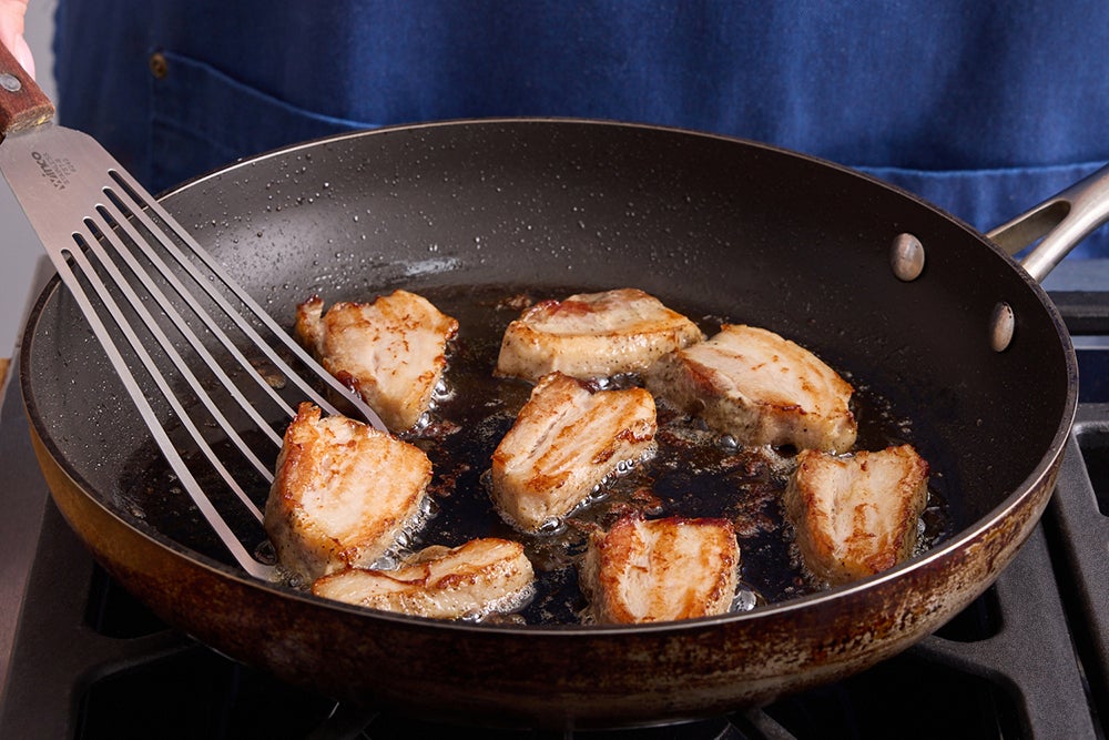 recipe-step-image-Slice & brown the pork belly}