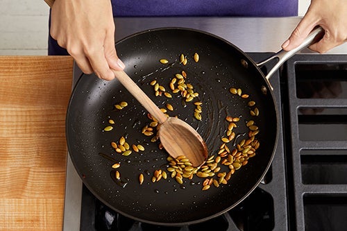 recipe-step-image-Toast the pepitas:}
