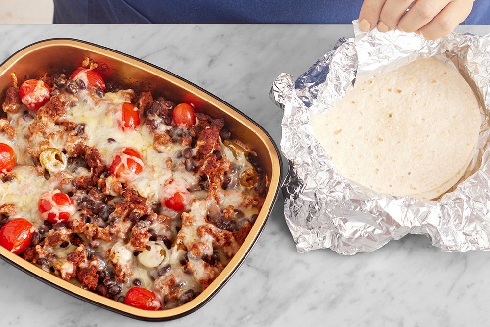 recipe-step-image-Warm the tortillas & serve your dish}