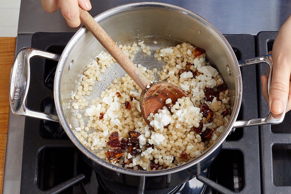 recipe-step-image-Finish the couscous & serve your dish}